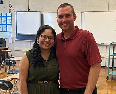 米凯拉·波佐·卡斯特罗 stands with her cooperating teacher, Ryan McHale, at Shikellamy High School.